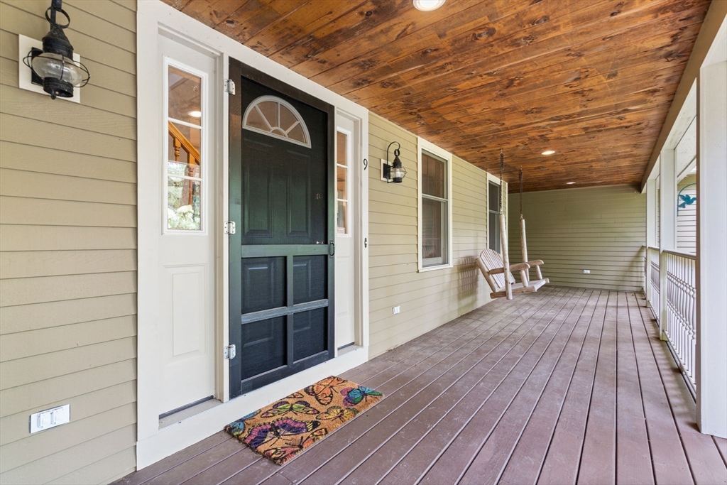 9 Stagecoach Road Princeton, MA 01541 - Photo 5 of 42 a view of a wooden door and a window