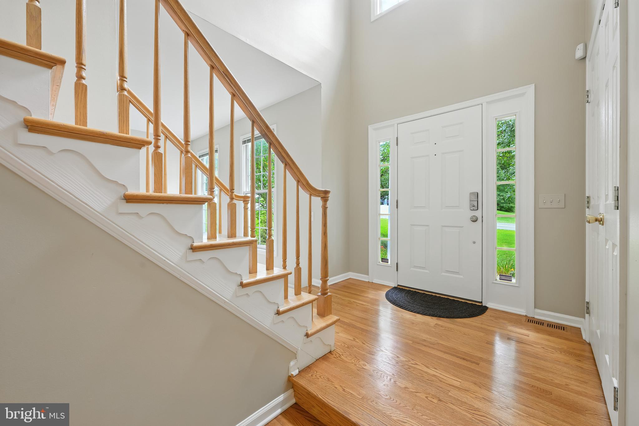 137 Cambridge Road Landenberg, PA 19350 - Photo 3 of 49 a view of an entryway with wooden floor and door