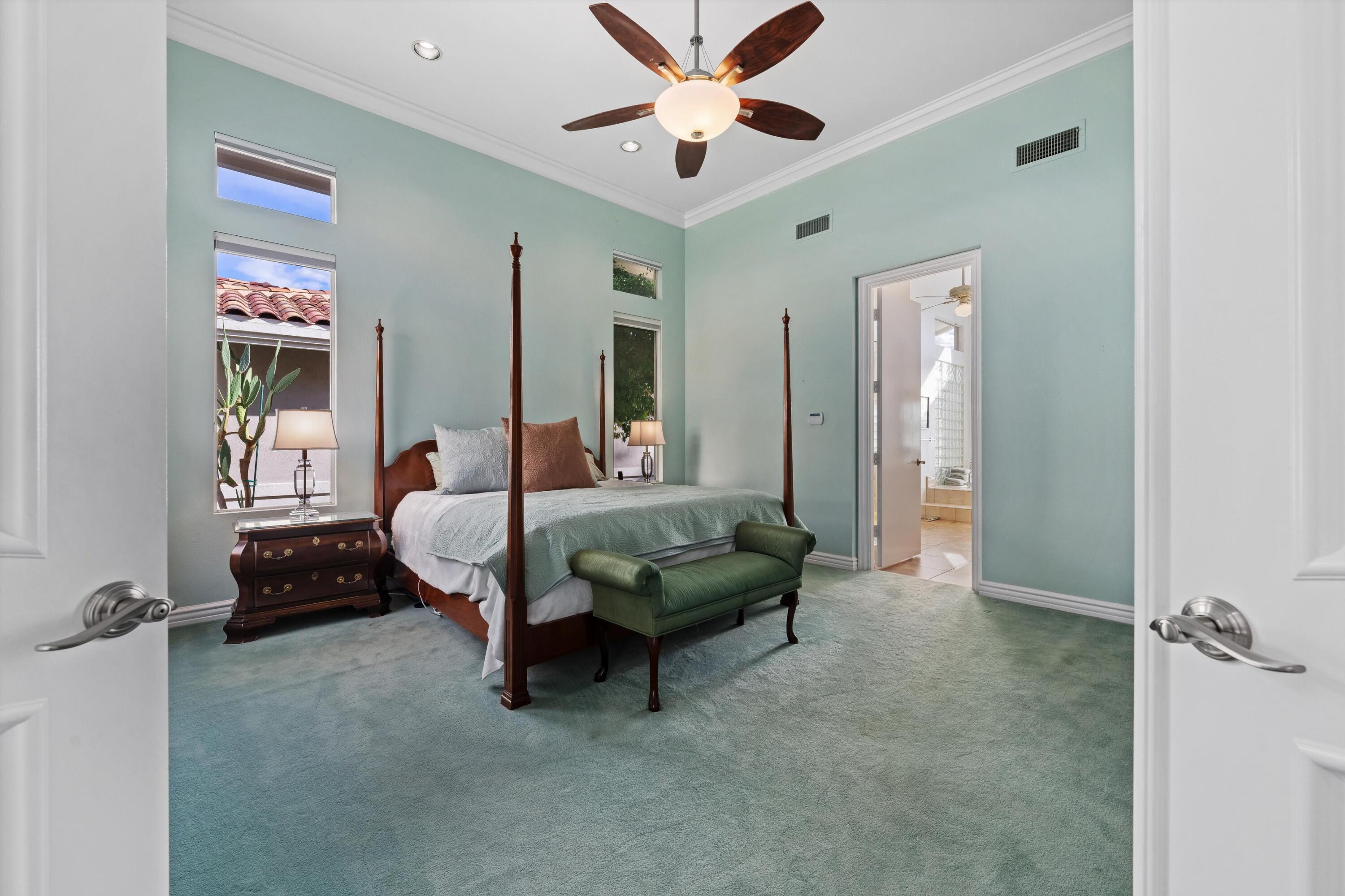 870 Deer Haven Circle Palm Desert, CA 92211 - Photo 24 of 37 a living room with furniture and a ceiling fan