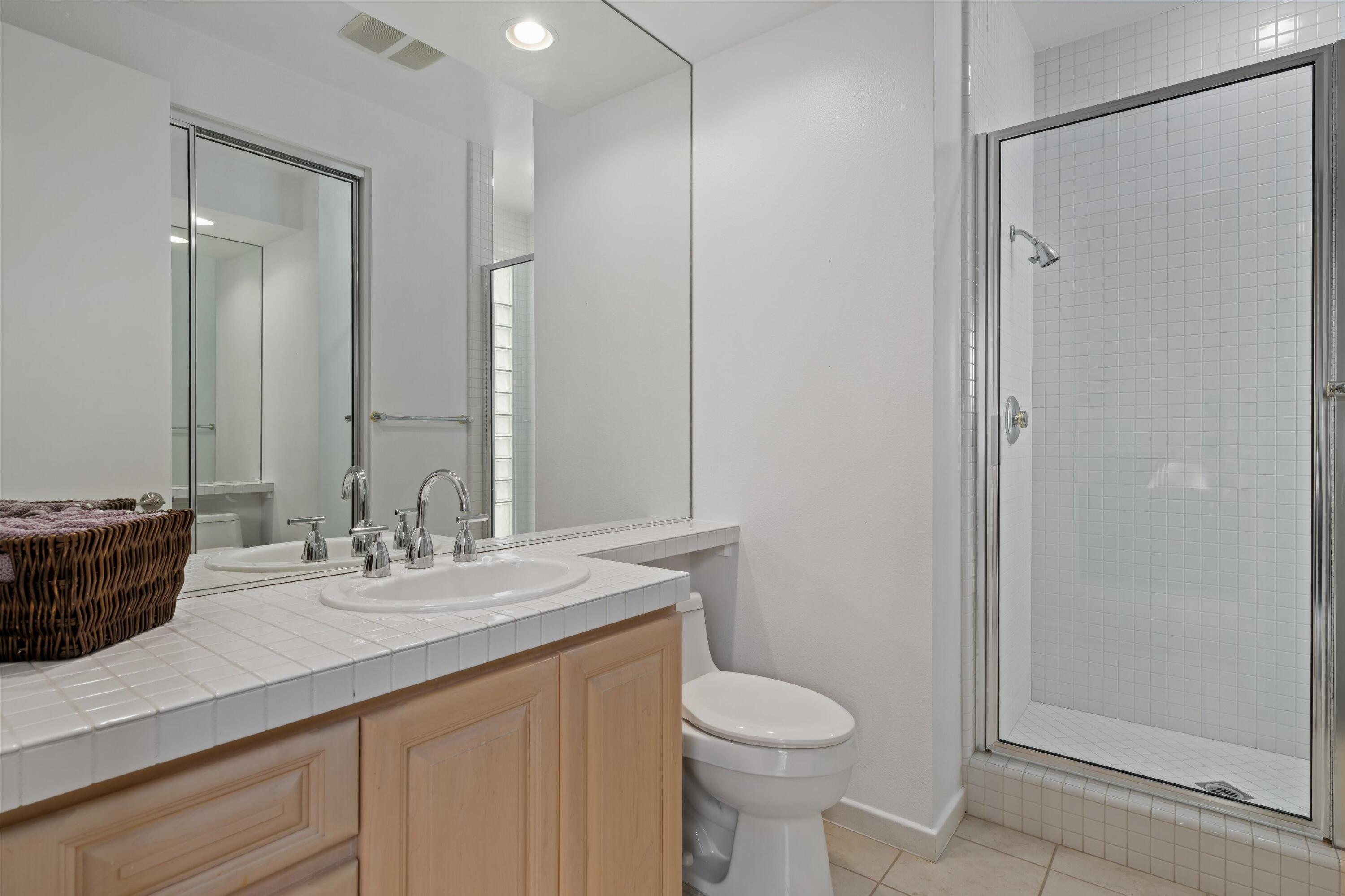 870 Deer Haven Circle Palm Desert, CA 92211 - Photo 29 of 37 a bathroom with a sink a toilet and shower