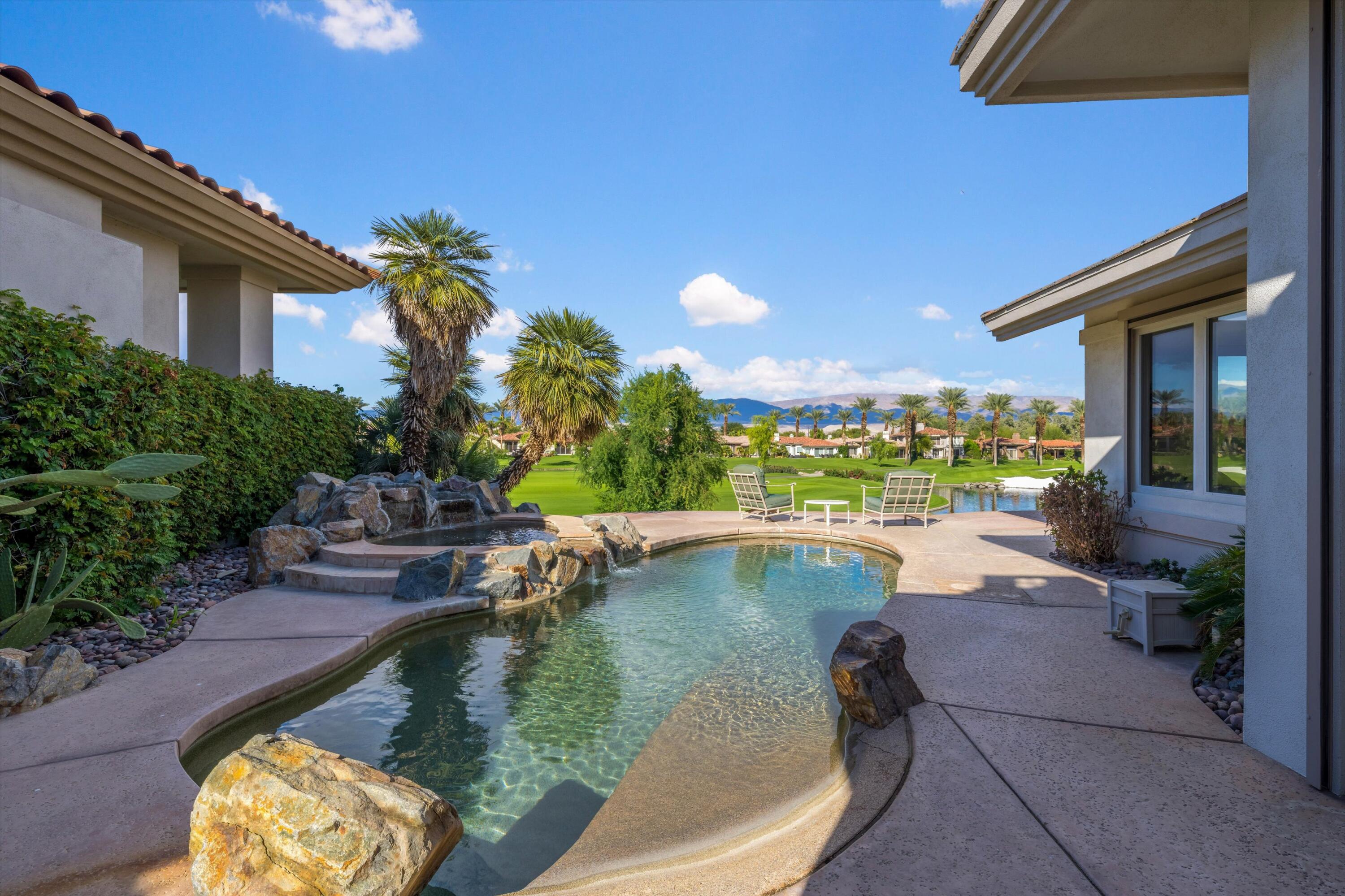 870 Deer Haven Circle Palm Desert, CA 92211 - Photo 34 of 37 a swimming pool with outdoor seating and yard