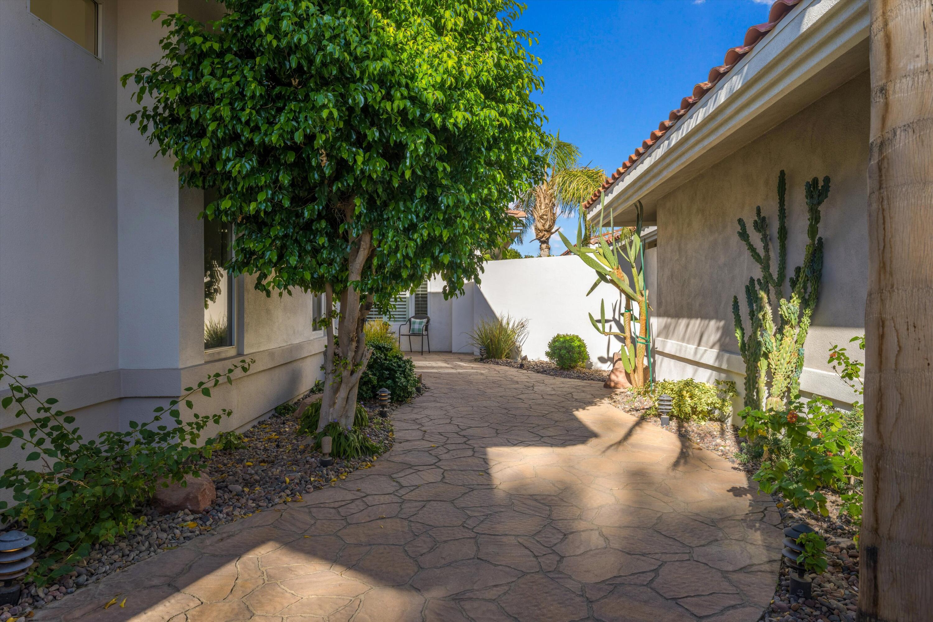 870 Deer Haven Circle Palm Desert, CA 92211 - Photo 5 of 37 a view of a back yard of the house