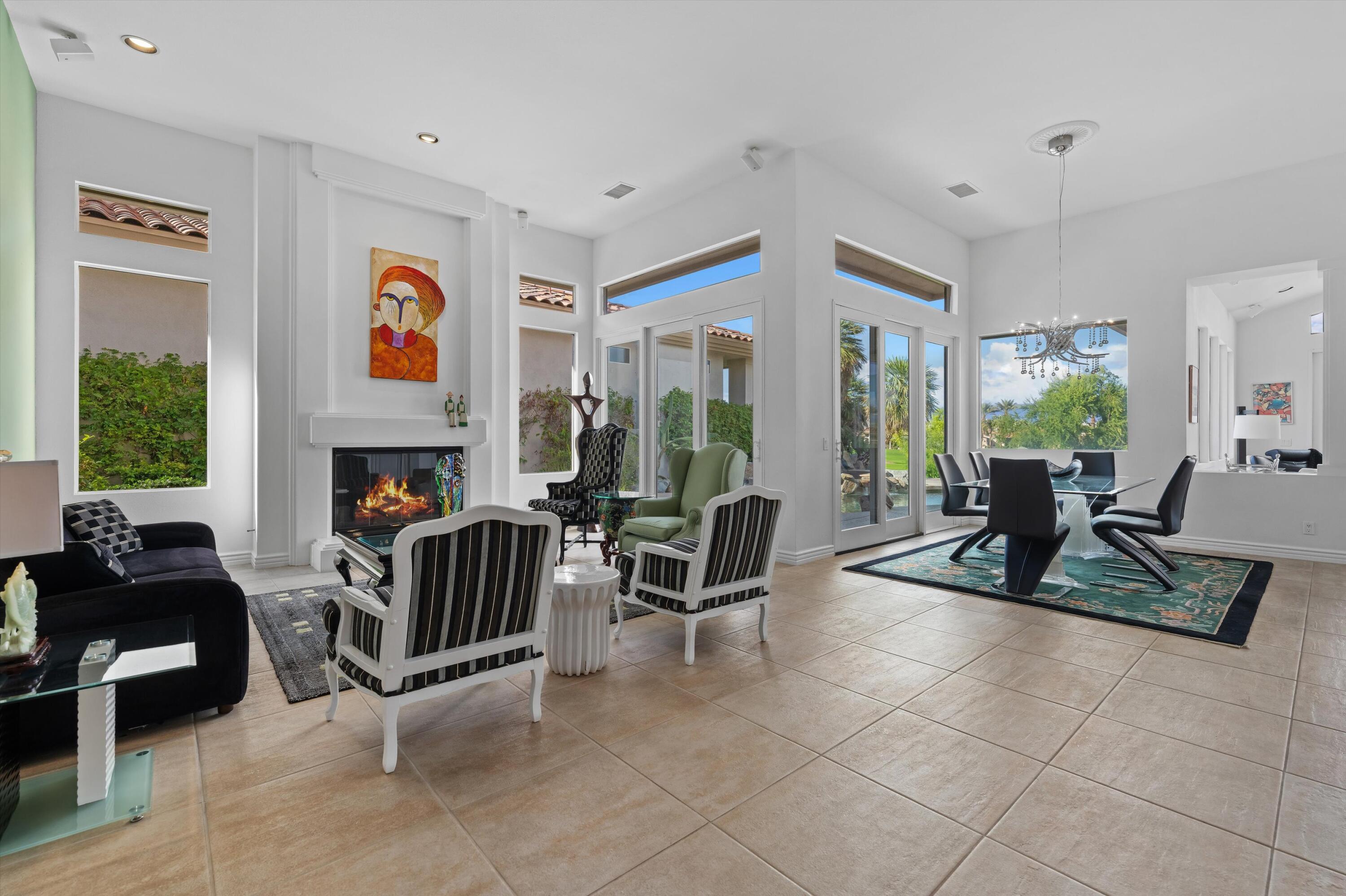 870 Deer Haven Circle Palm Desert, CA 92211 - Photo 10 of 37 a living room with furniture and a fireplace
