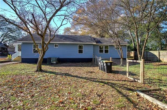 a house view with a backyard space