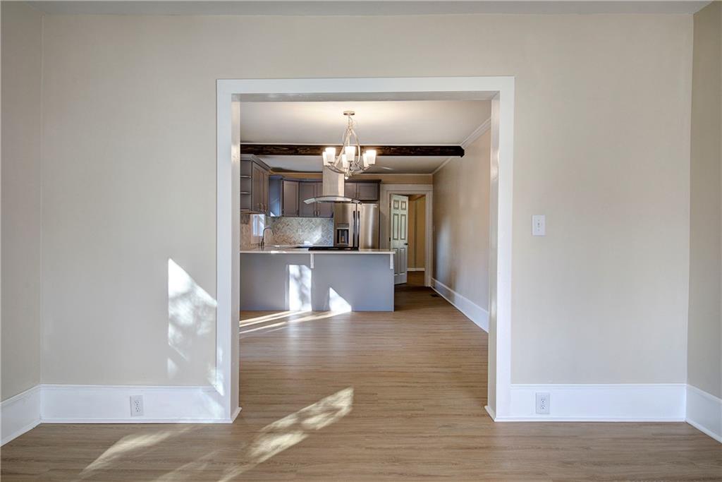 415 East 10th Street Rome, GA 30161 - Photo 15 of 42 a view of a living room with wooden floor