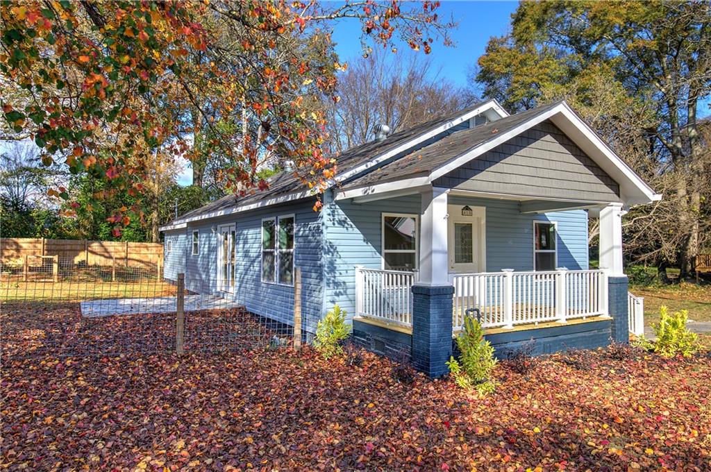 415 East 10th Street Rome, GA 30161 - Photo 3 of 42 a view of a house with a yard