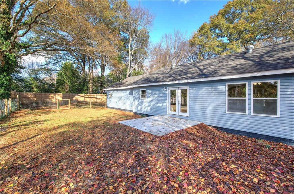 415 East 10th Street Rome, GA 30161 - Photo 41 of 42 a view of a house with a yard