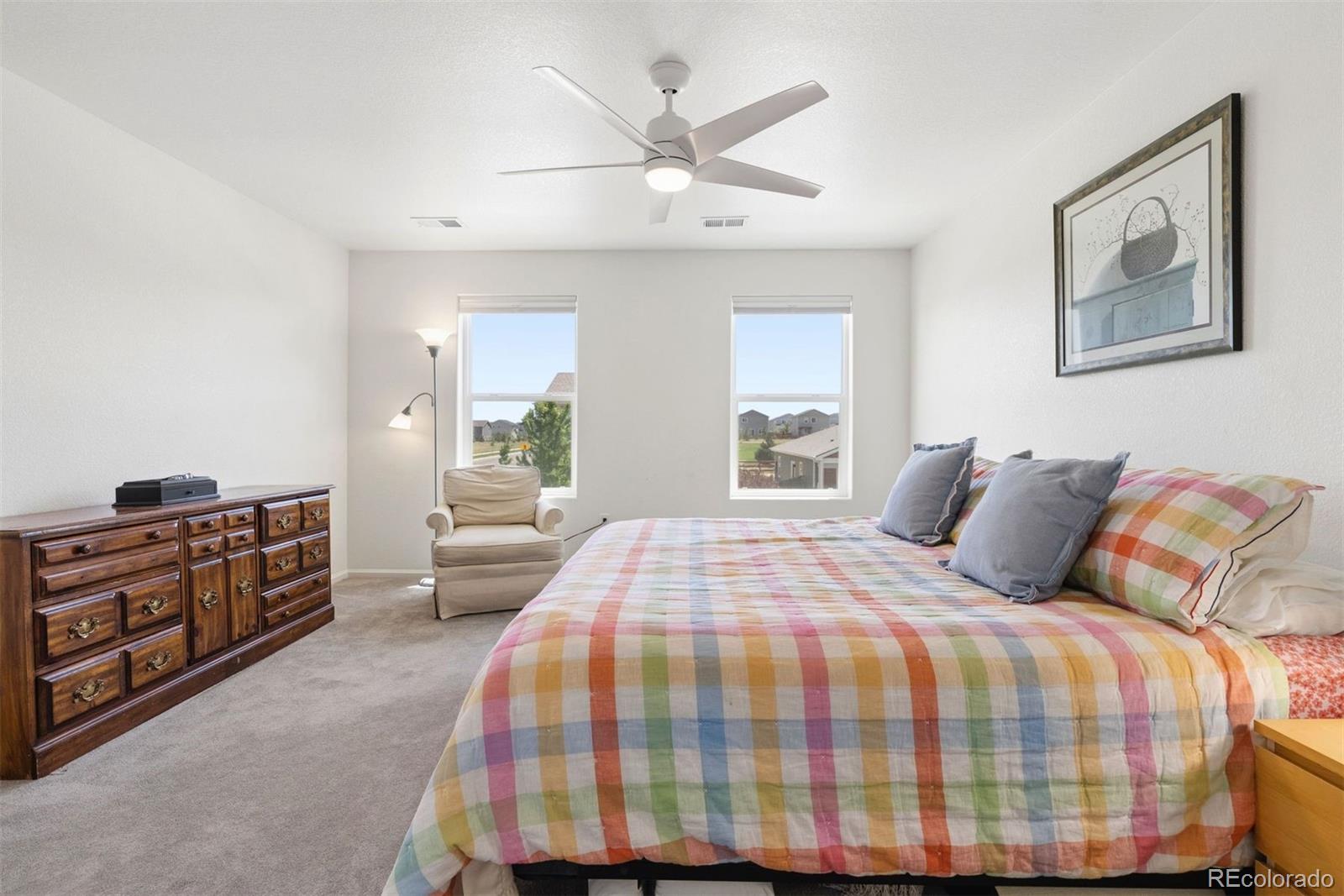 7307 Animas Avenue Frederick, CO 80530 - Photo 26 of 49 a bedroom with a bed and window