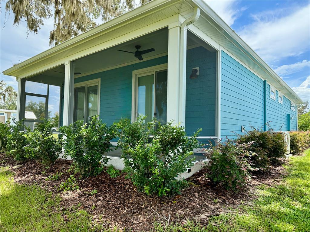 12030 Lakeshore Way Oxford, FL 34484 - Photo 15 of 38 a view of a house with a yard