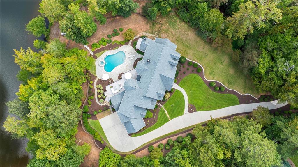 1065 Stonegate Court Roswell, GA 30075 - Photo 1 of 1 an aerial view of a house having outdoor space
