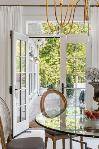 a living room with fireplace furniture and a flat screen tv