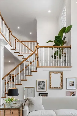 an aerial view of a house with swimming pool and garden space
