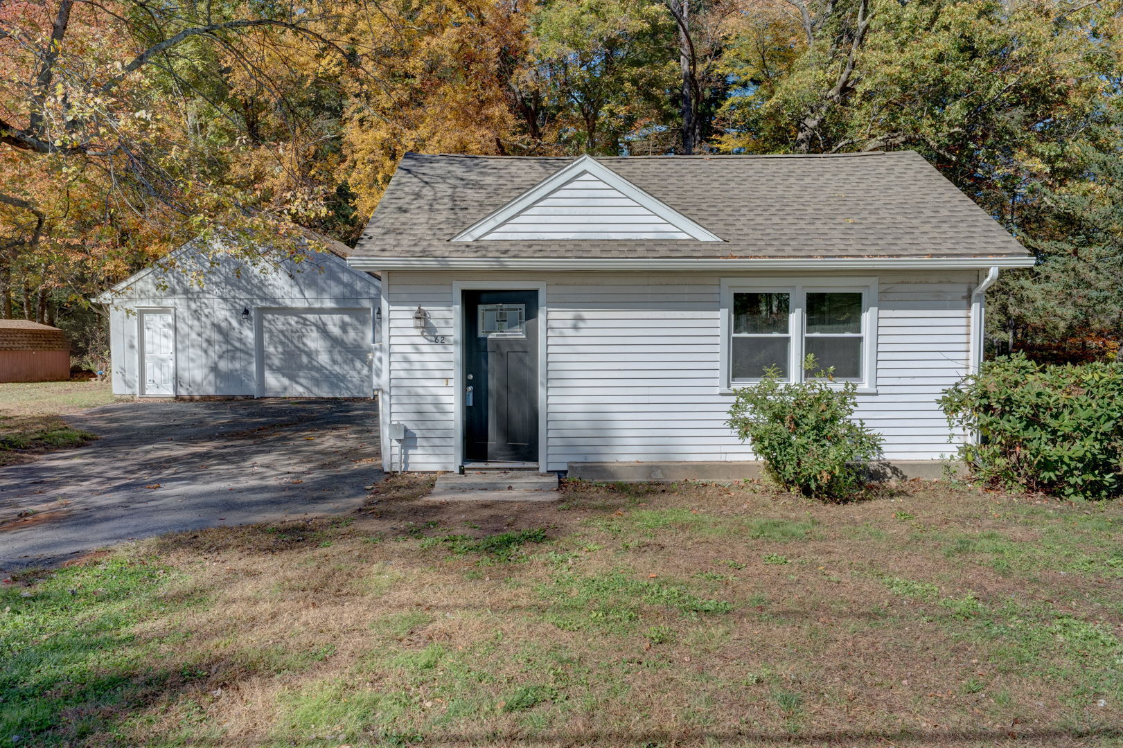 front view of a house and a yard