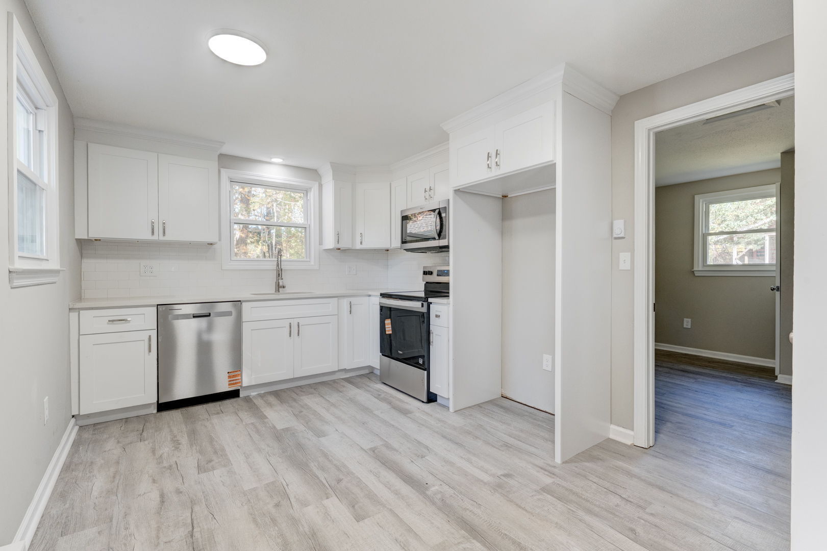 62 Rice Road East Windsor, CT 06016 - Photo 3 of 18 a kitchen with a sink cabinets stainless steel appliances and window