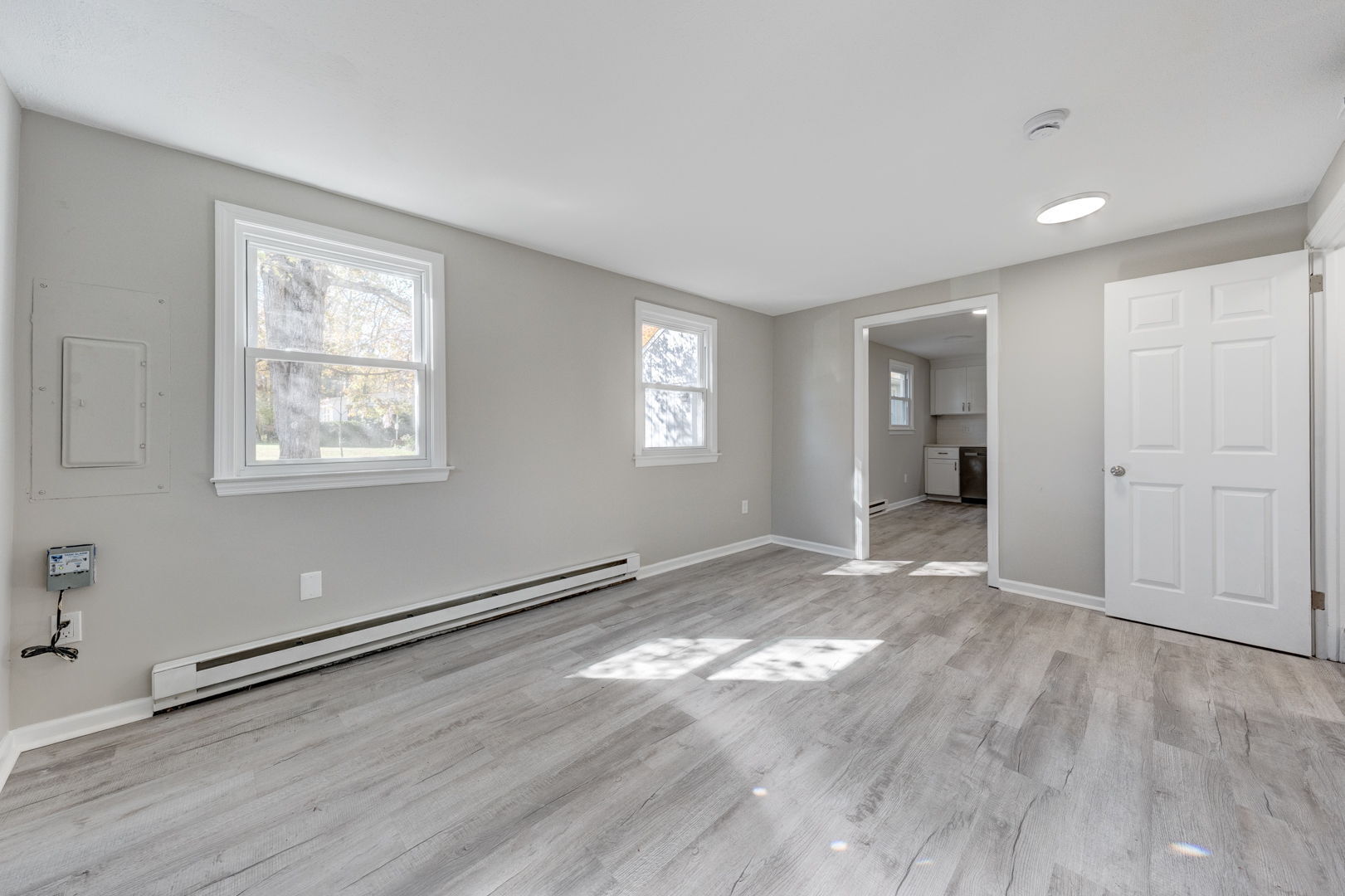 62 Rice Road East Windsor, CT 06016 - Photo 9 of 18 a view of empty room with wooden floor and window
