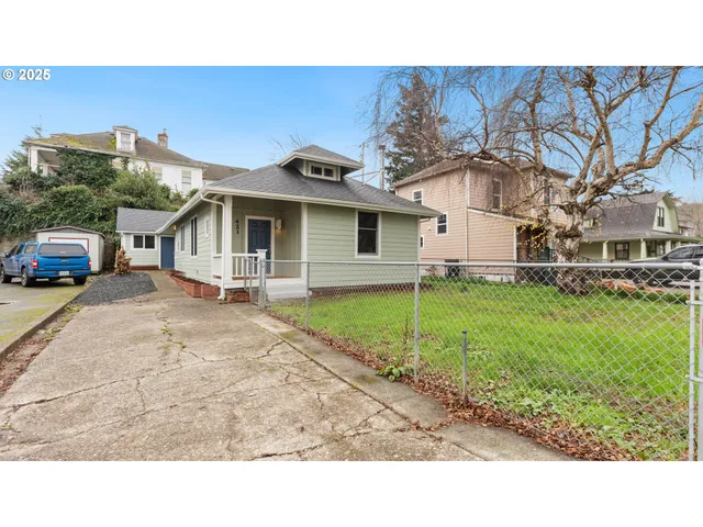 a house view with a garden space