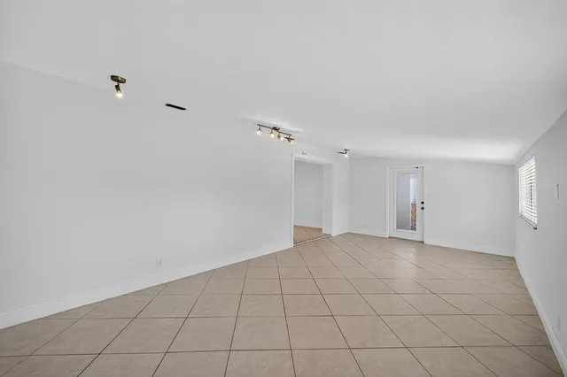 a view of storage and utility room with a sink