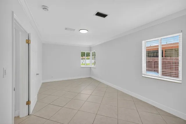 a view of a house with a yard and plant