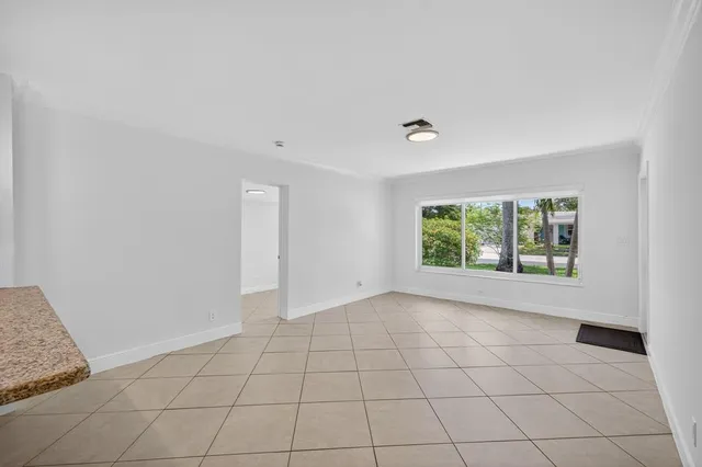 a kitchen with stainless steel appliances granite countertop a sink and stove