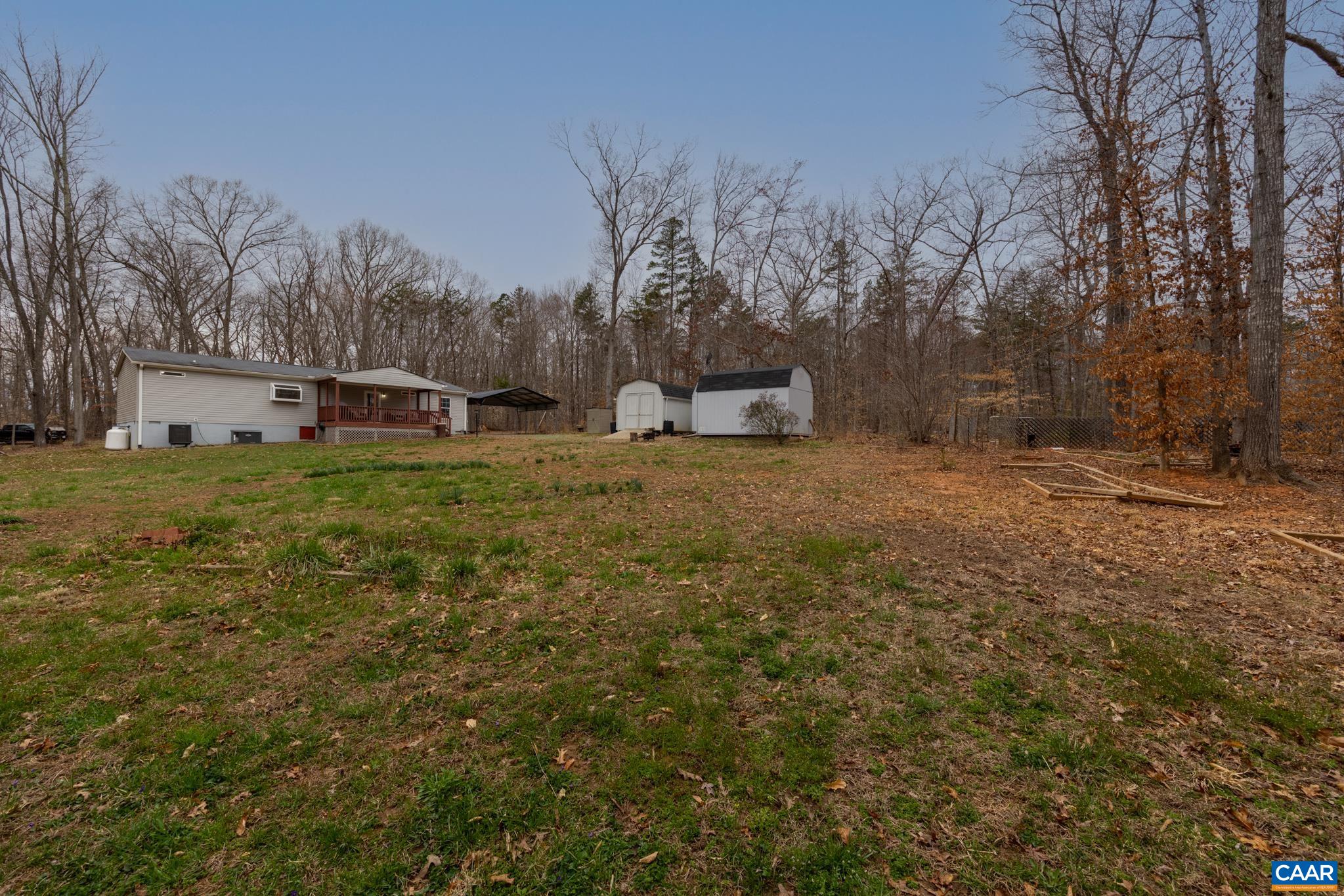 2205 Bybee Road Louisa, VA 23093 - Photo 3 of 28 a view of a yard with large tree