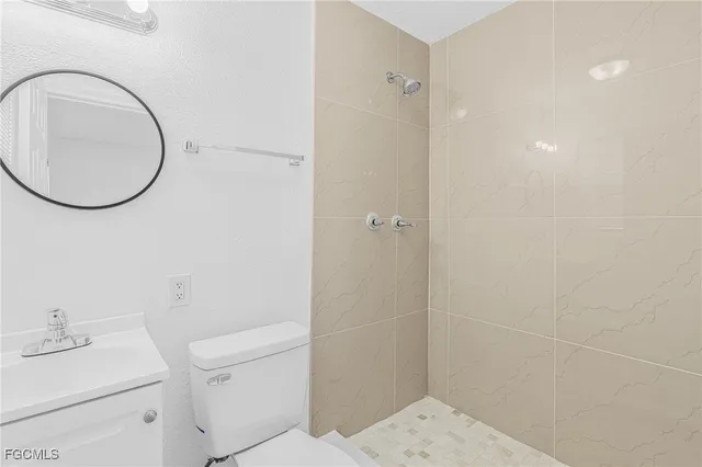 a view of a hallway with staircase