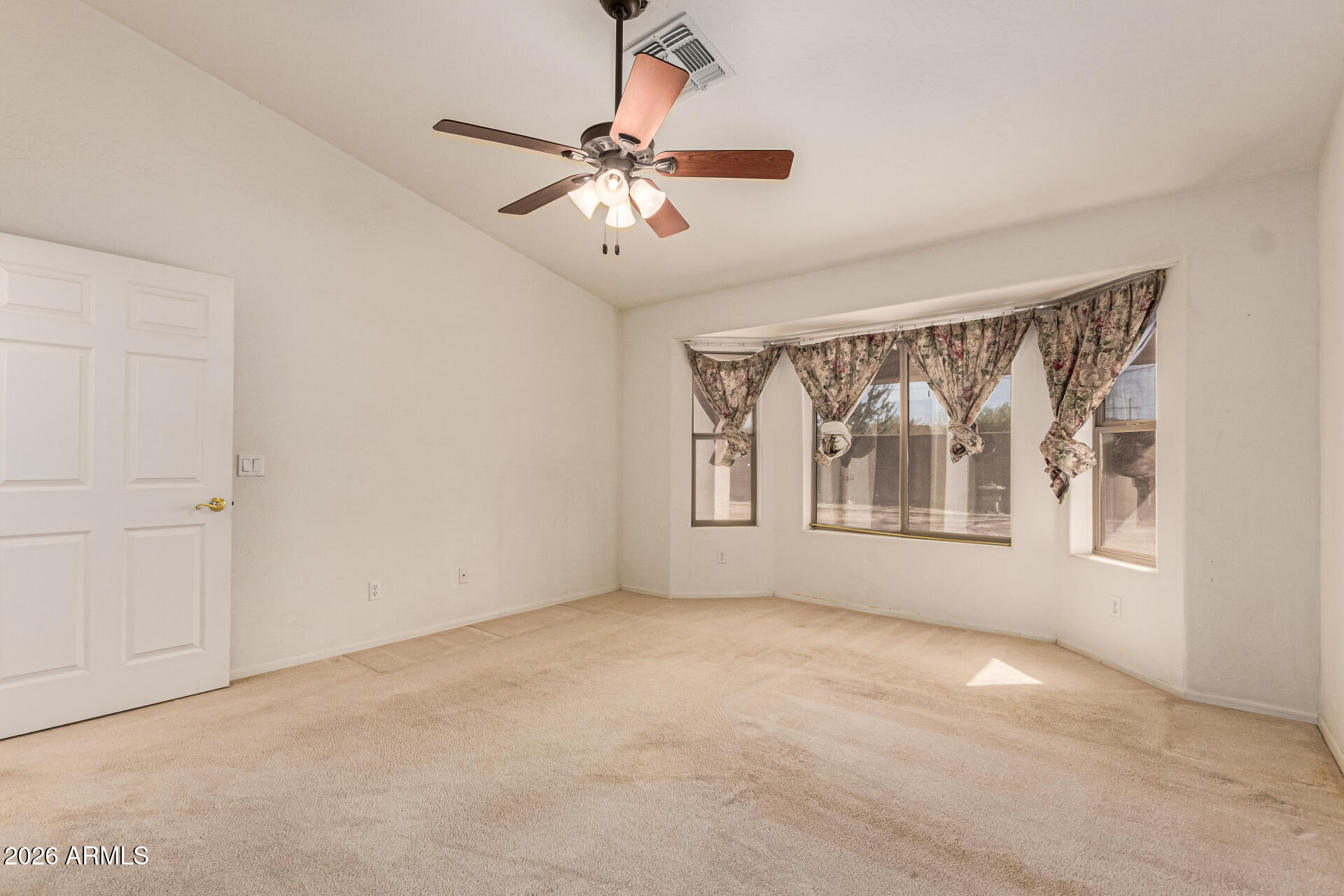 3123 South Del Rancho Mesa, AZ 85212 - Photo 9 of 15 a view of an empty room with a window