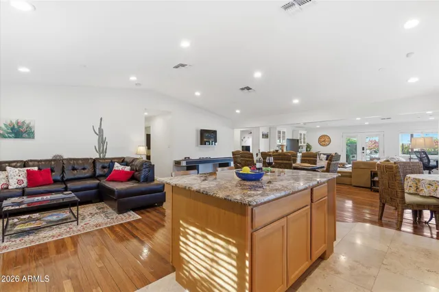 a view of a living room and kitchen