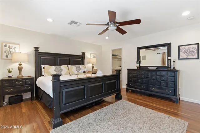 a bed room with bed and window