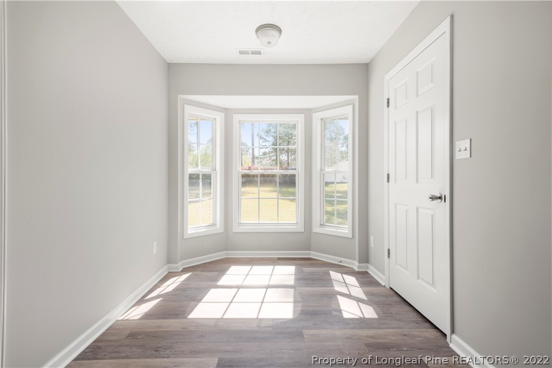 1150 Roundabout Road Cameron, NC 28326 - Photo 11 of 22 a view of an empty room with a window
