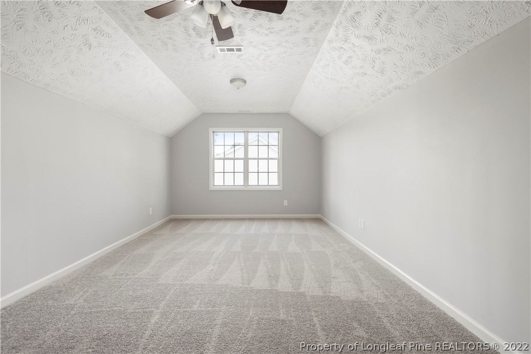 1150 Roundabout Road Cameron, NC 28326 - Photo 14 of 22 a view of an empty room with a window