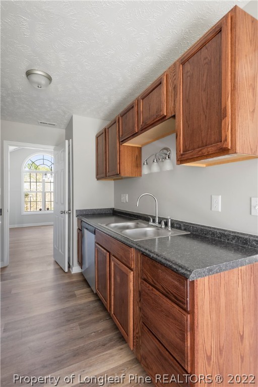 1150 Roundabout Road Cameron, NC 28326 - Photo 9 of 22 a kitchen with stainless steel appliances granite countertop a sink stove and cabinets