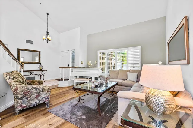 a living room with furniture or couch and a window