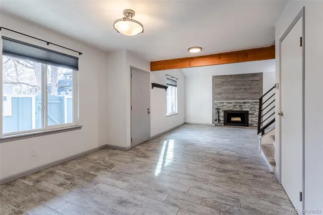 a view of livingroom with furniture and fireplace