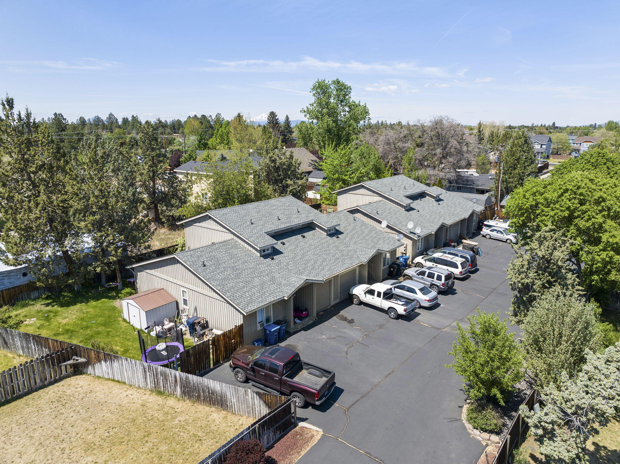2211 Southwest Quartz Avenue Redmond, OR 97756 - Photo 16 of 26 an aerial view of multiple houses with yard