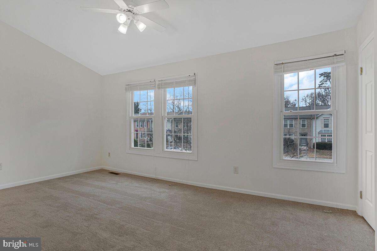 2144 Commissary Circle Odenton, MD 21113 - Photo 14 of 35 an empty room with windows and fan