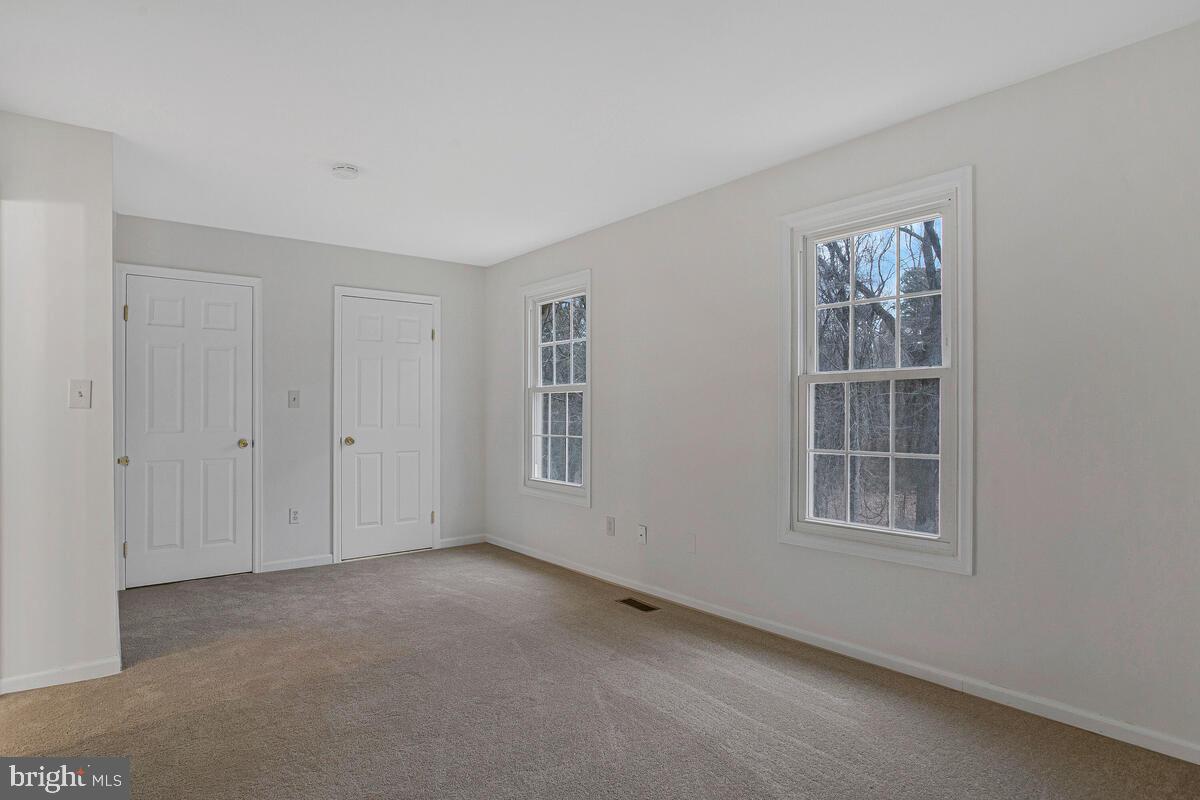2144 Commissary Circle Odenton, MD 21113 - Photo 20 of 35 a view of an empty room with a window
