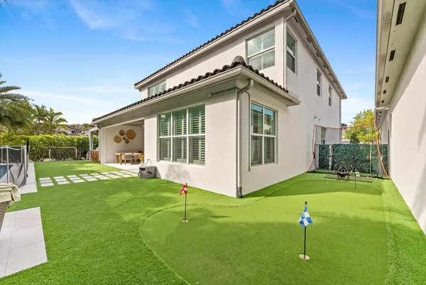 a kitchen with stainless steel appliances granite countertop a stove and a refrigerator