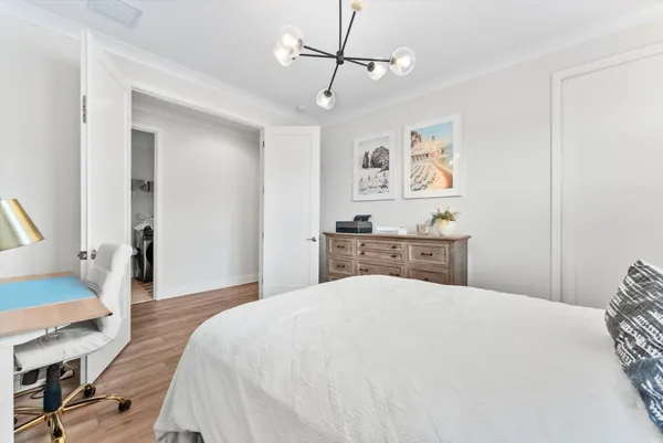 a workspace with furniture and wooden floor