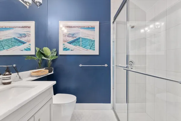 an aerial view of a house with a yard and plants