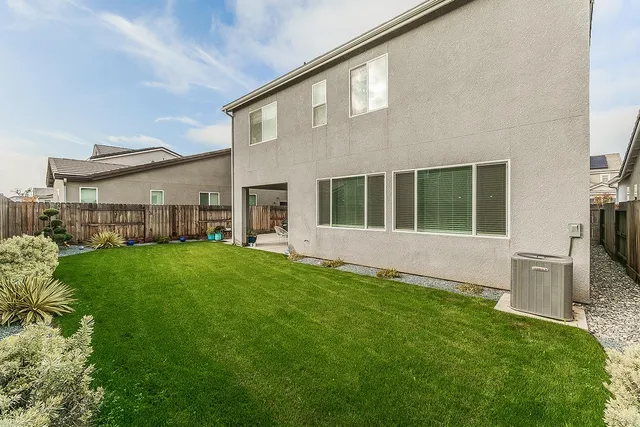 a view of a chairs and table in a room