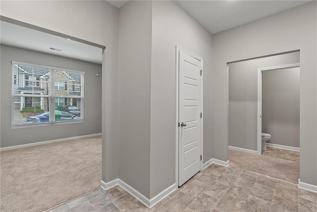 2650 Axel Ridge Decatur, GA 30034 - Photo 15 of 29 an empty room with windows and closet