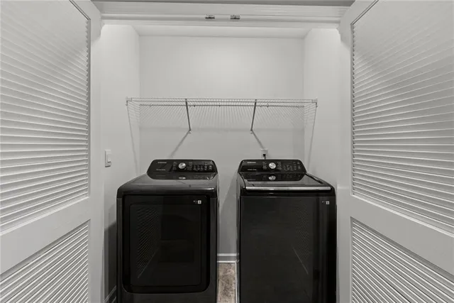 a kitchen with a stove and a refrigerator