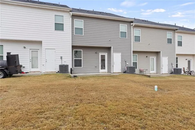 a view of a house with swimming pool