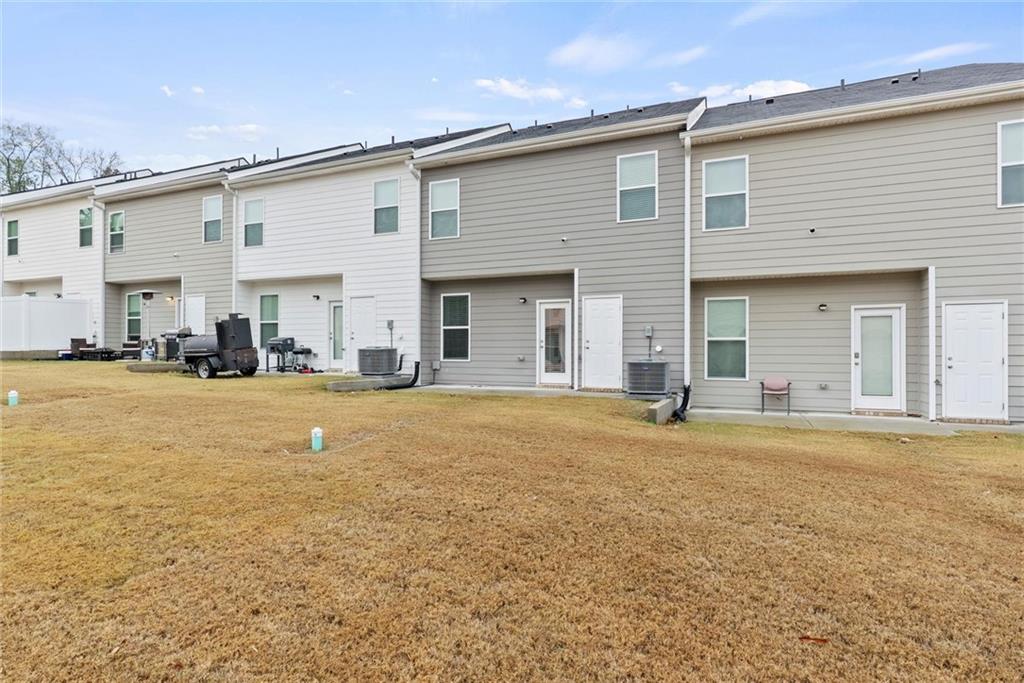 2650 Axel Ridge Decatur, GA 30034 - Photo 28 of 29 a view of a white house with a swimming pool