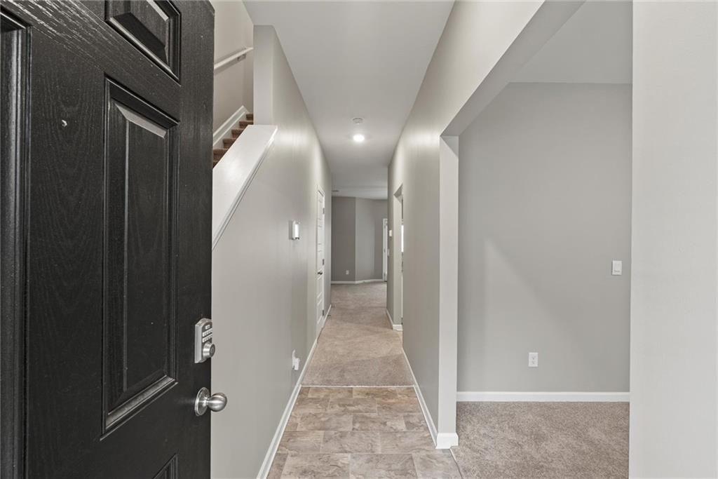 2650 Axel Ridge Decatur, GA 30034 - Photo 4 of 29 a view of a hallway with wooden floor and entryway