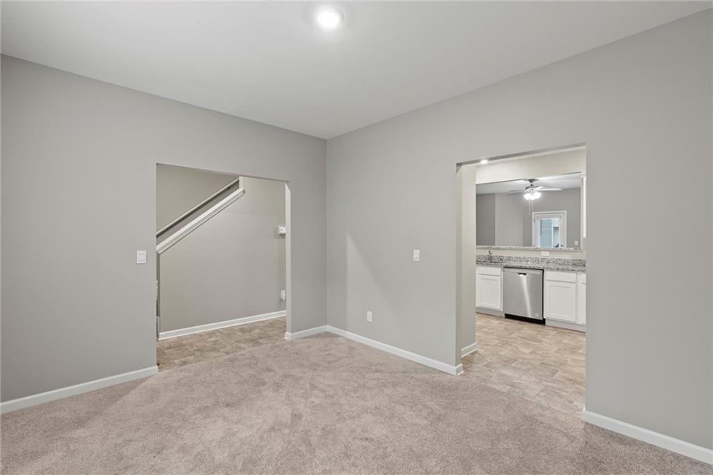 2650 Axel Ridge Decatur, GA 30034 - Photo 5 of 29 a view of a room with a stylish ceiling fan and entryway