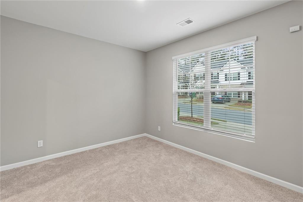 2650 Axel Ridge Decatur, GA 30034 - Photo 6 of 29 a view of an empty room with a window
