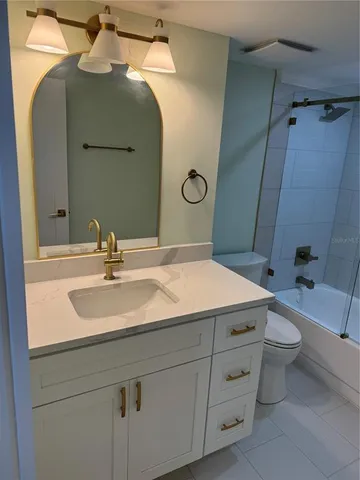 a bathroom with a shower and a tub