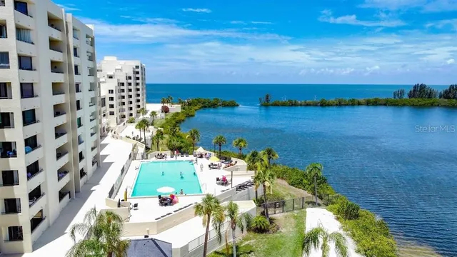 a kitchen with cabinets stainless steel appliances and a counter space