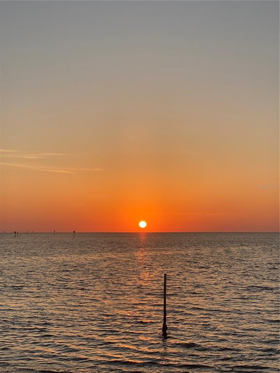 6035 Sea Ranch Drive, Unit 902 Hudson, FL 34667 - Photo 26 of 32 a view of ocean with beach